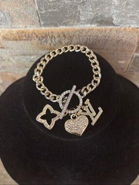 Gold Toned Charm Bracelet with Pave Crystal Charms